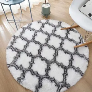 Macro detail of round plush shaggy rug featuring grey and white Moroccan quatrefoil pattern