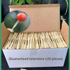 Disposable bamboo fruit forks with heart-shaped tops in bulk cardboard box packaging
