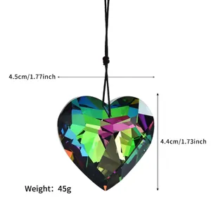 Detailed macro of a 45mm heart-shaped crystal prism pendant with rainbow light effects