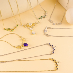 Elegant deer antler necklaces with colorful gemstones and pearls in gold and silver finish