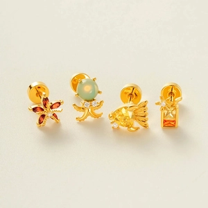 Lot de boucles d'oreilles dorées série océan avec étoile de mer et poulpe en cristal