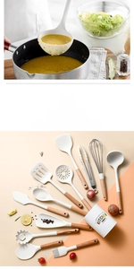 Close-up of 12-piece white silicone kitchen utensil set with wooden handles and storage bucket