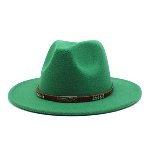 Close-up of green wool fedora with a brown braided leather band and engraved bronze buckle