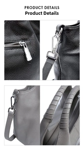 Close-up of soft leather tote bag details including silver zippers and woven handles