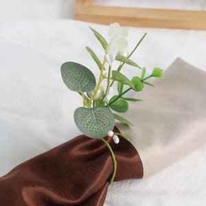 Green eucalyptus and pearl napkin ring for elegant wedding and holiday table decor