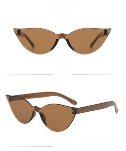 Detailed views of brown cat-eye sunglasses featuring a translucent frame and matching lenses