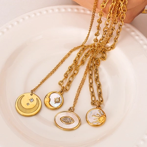 18K gold plated multilayer necklace featuring sun, moon, and star pendants with shell inlay