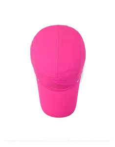 Detailed top view of breathable mesh sports cap in rose red with quick-dry fabric texture