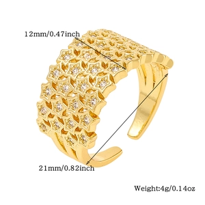 Detail of adjustable gold star ring showing 12mm width and 21mm diameter dimensions