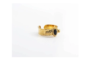 Macro shot of 18K gold plated hammered texture ring with black teardrop gemstone detail