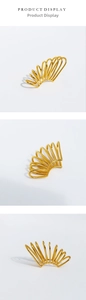Three-way view of a minimalist metal spiral ear cuff showing curved multi-layer lines