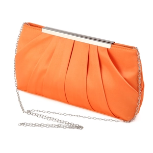 Detail of orange pleated satin evening clutch bag with detachable silver chain strap