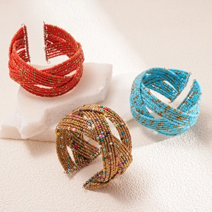 Bohemian multi-layer seed bead wrap bracelet in vibrant red, blue and gold colors