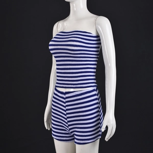 Detail of blue and white striped crochet knit tube top and matching shorts on a mannequin