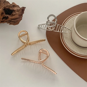 Set of 3 large metal shark hair claws in gold, silver, and rose gold for thick hair