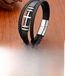 Detail view of multi-layer leather cross bracelet with sizes 19cm 21cm and 23cm