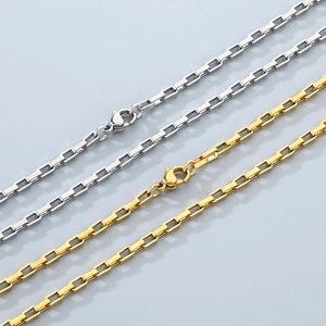Detail of silver and gold stainless steel box chains with lobster claw clasps