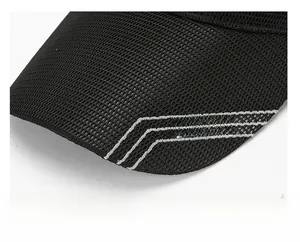 Detailed close-up of breathable mesh fabric and reinforced brim with SPORT embroidery