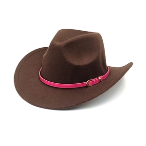 Close-up of deep brown wool felt cowboy hat featuring a pink leather belt with gold buckle