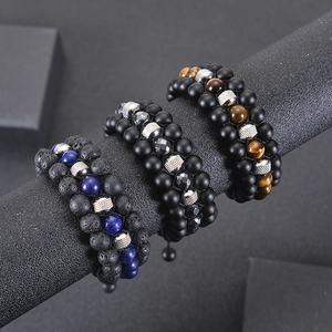 Three-layer men's beaded bracelet featuring tiger eye stone and volcanic lava rock beads