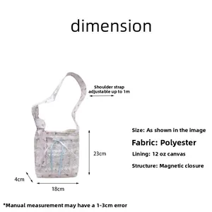 Detail view of pink floral lace canvas bag showing size dimensions 18x23x4cm and bow detail