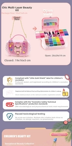 Detailed multi-layer children makeup set with eyeshadow and brushes in a pink handbag