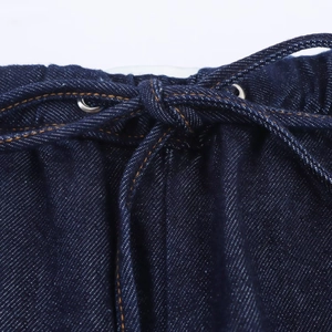 Ensemble en denim bleu foncé pour femmes avec taille à cordon, œillets métalliques et surpiqûres