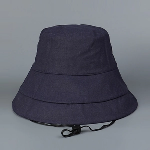 Detail of navy blue sun hat with tiered stitching, wide brim and adjustable windproof cord