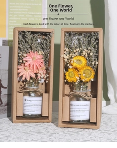 Macro shot of dried flower bouquets in glass jars with rustic twine and Kraft box packaging