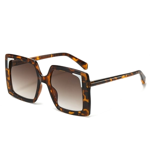 Classic square tortoise shell sunglasses with oversized frames and brown gradient lenses