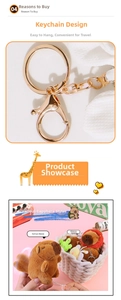 Detail of plush capybara keychain with rotatable tail and durable gold lobster clasp