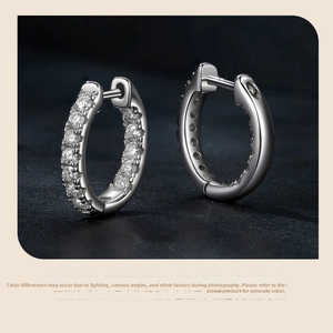 Close-up of S925 sterling silver hoop earrings with sparkling micro-pave zircons