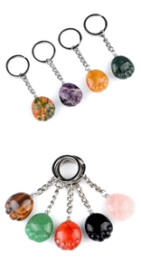 Variety of natural crystal and agate keychains carved into cute animal paw shapes