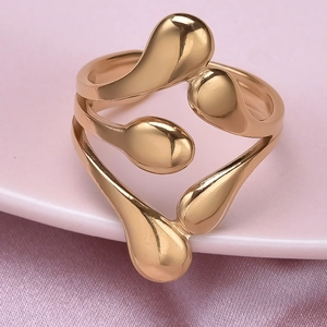 Macro shot of liquid-metal style 304 stainless steel ring with polished golden finish