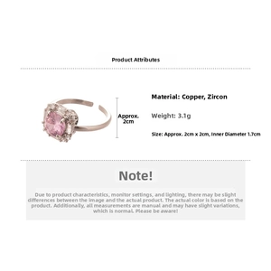 Detail view of pink cubic zirconia flower ring with 2cm diameter and silver band