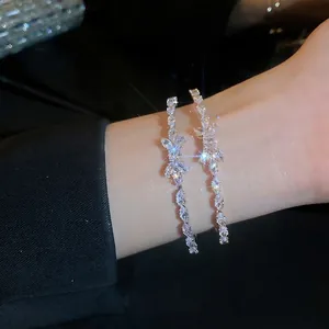 Elegant zircon bow open bangle for women featuring sparkling marquise cut crystals