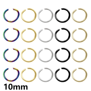 Macro detail of 10mm stainless steel open jump rings in five metallic colors