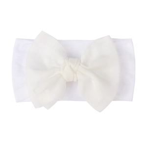 Detailed view of white nylon baby headband with a soft mesh bow accent for toddlers