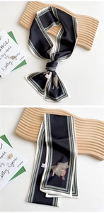 Detail of 100% silk skinny scarf with equestrian saddle print and green stripes