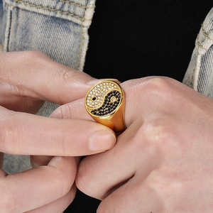 Golden men's signet ring with Yin Yang Tai Chi design featuring sparkling crystals