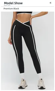 Dettaglio dei leggings da yoga da donna con vita a V incrociata e profili bianchi a contrasto