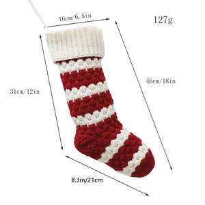 Knitted red and white striped Christmas stocking gift bag with dimension markers 46cm size