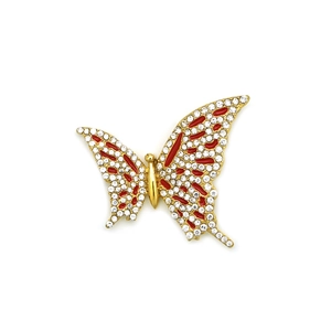 Detailed view of hip-hop butterfly pendant with red enamel and sparkling rhinestones