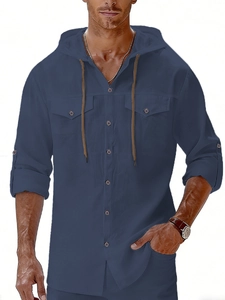 Detail of dark blue linen hooded shirt with drawstring and chest pockets for men