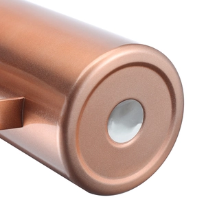 Detailed close-up of the bronze insulated mug bottom with a heat-conductive silver disc