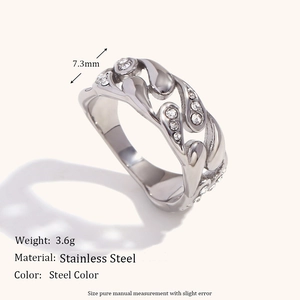 Polished stainless steel wavy open ring with cubic zirconia stones in silver finish