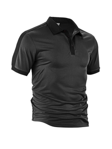 Detail of black polo shirt showing three-button collar and quick-dry fabric texture