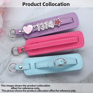 DIY PU leather wristlet keychains in purple, pink, and blue with heart charms