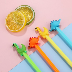 Creative dinosaur gel pens in four colors on a pink and blue pastel background
