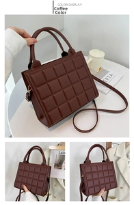 Detail of dark brown quilted tote bag showing texture and golden hardware accents